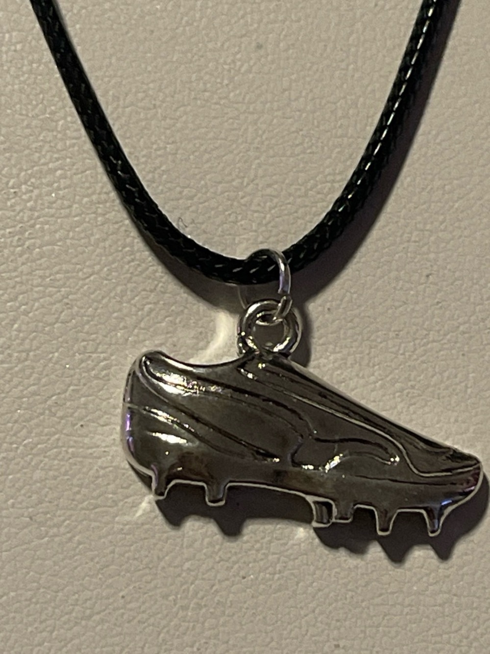 Silver Soccer Cleat Pendant Necklace - Black Cord